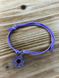 Bracelet petite fleur avec cordon violet