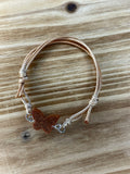 Bracelet papillon avec cordon beige